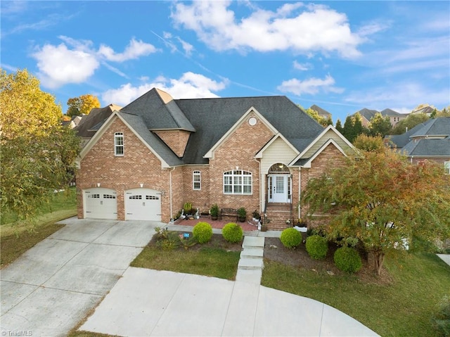 view of front of home featuring a mountain view and a garage