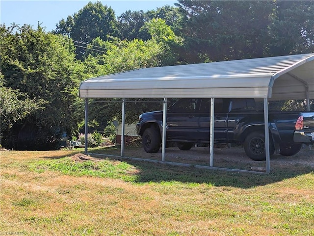 view of car parking featuring a yard and a carport