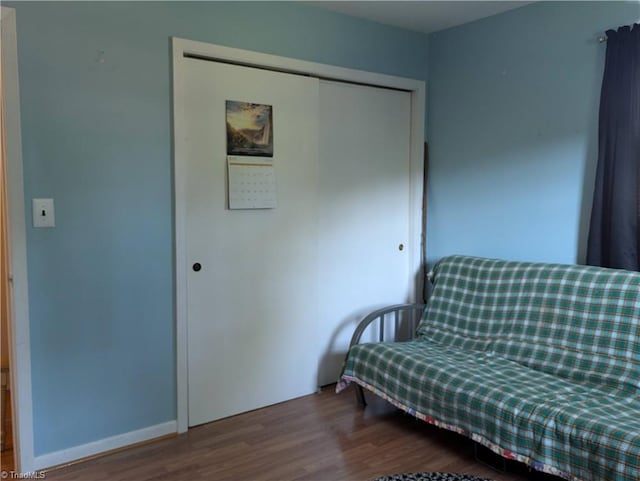 living area with wood-type flooring