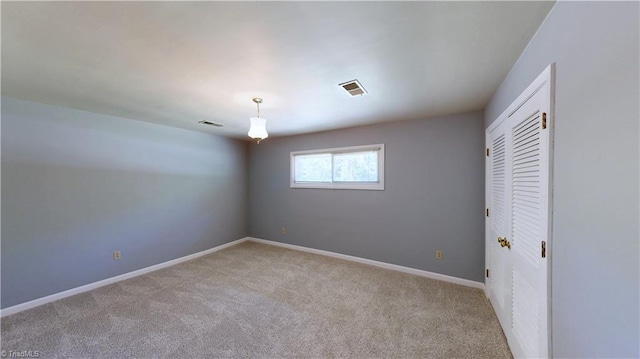 3618 Rockwood Dr, High Point, NC 27265 - carpeted empty room featuring baseboards