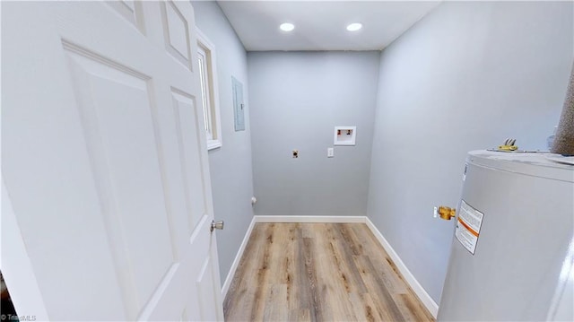 3618 Rockwood Dr, High Point, NC 27265 - laundry area with washer hookup, laundry area, electric dryer hookup, light wood finished floors, and electric water heater