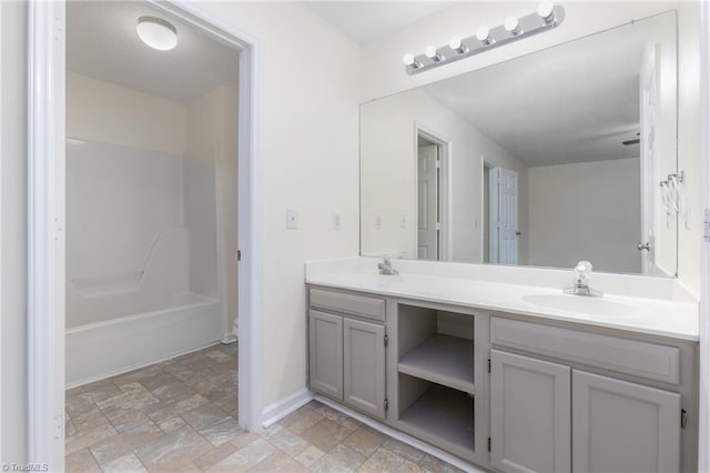 bathroom with shower / tub combination and vanity