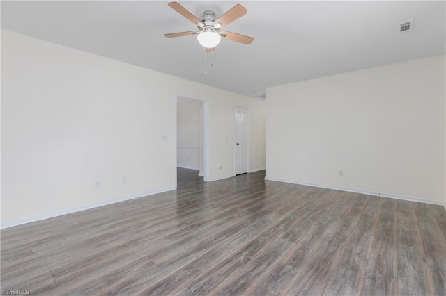 unfurnished room with hardwood / wood-style floors and ceiling fan