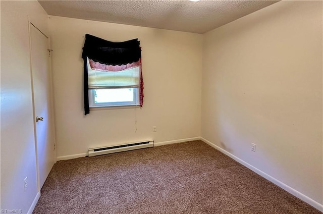 empty room with a baseboard radiator, a textured ceiling, and carpet flooring