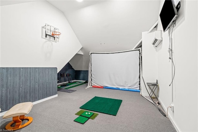 game room with carpet, a wall unit AC, and lofted ceiling