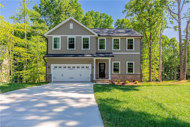 2991 Wesley Farm Ln, Sophia, NC 27350 - view of front of house with an attached garage, driveway, and a front lawn
