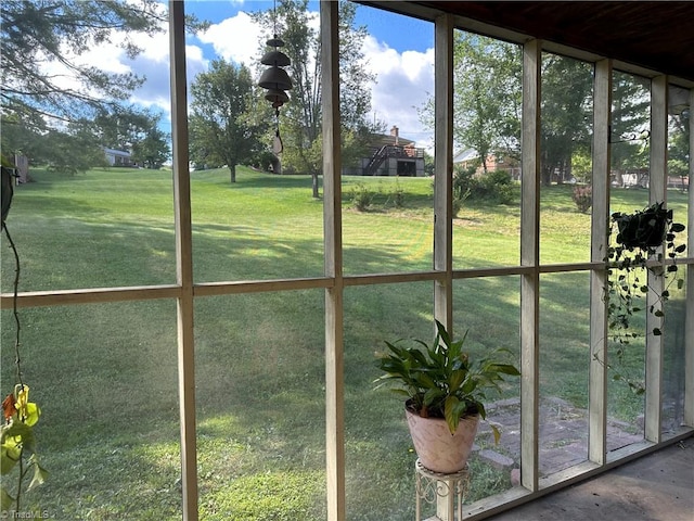 unfurnished sunroom featuring a wealth of natural light