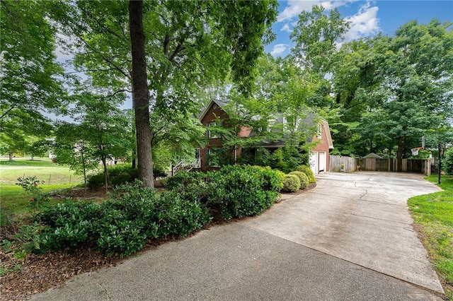 3016 Havasu Way, High Point, NC 27265 - view of property hidden behind natural elements with driveway and view of wooded area
