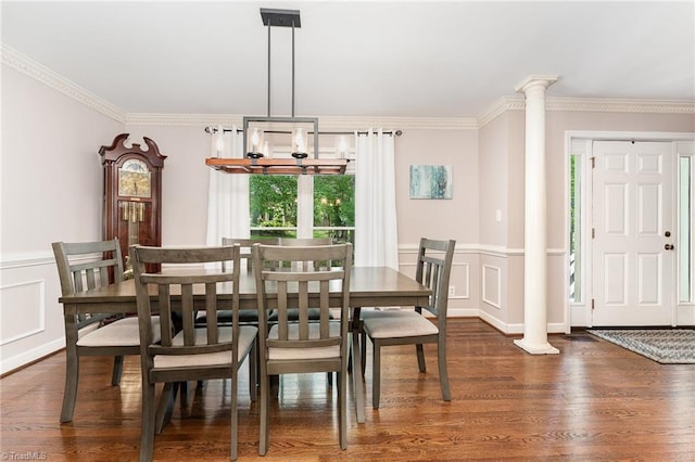 3016 Havasu Way, High Point, NC 27265 - dining area with ornate columns, a decorative wall, a chandelier, ornamental molding, and wood finished floors