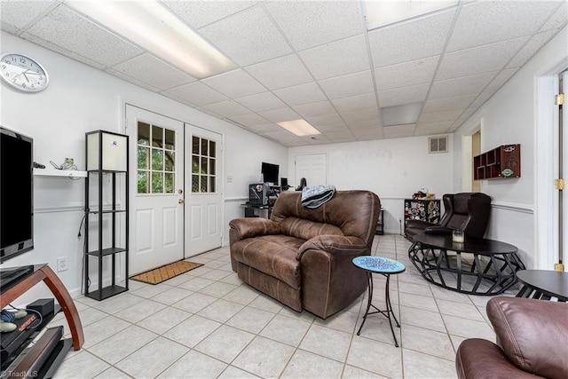 3016 Havasu Way, High Point, NC 27265 - living room with light tile patterned floors and a paneled ceiling