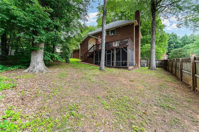 3016 Havasu Way, High Point, NC 27265 - back of property with a wooden deck, a chimney, stairway, and a sunroom
