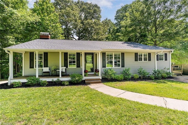 1420 Rankin Rd, Greensboro, NC 27405 - ranch-style home with covered porch, a front lawn, a chimney, and a shingled roof