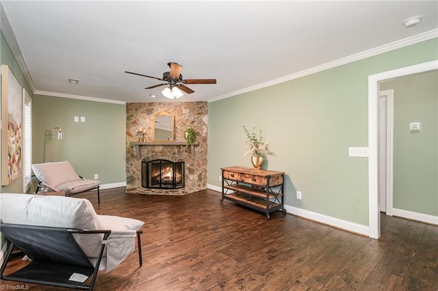 1420 Rankin Rd, Greensboro, NC 27405 - living area with crown molding, wood finished floors, a fireplace, and a ceiling fan