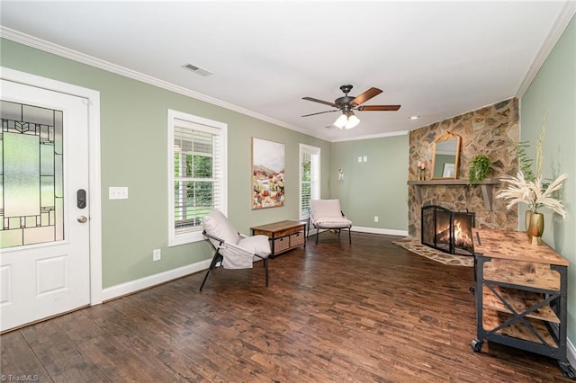 1420 Rankin Rd, Greensboro, NC 27405 - living area with wood finished floors, crown molding, a fireplace, and ceiling fan