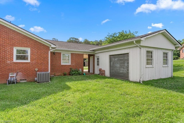 415 Crestview Dr, Thomasville, NC 27360 - back of house with brick siding, a garage, a yard, driveway, and board and batten siding
