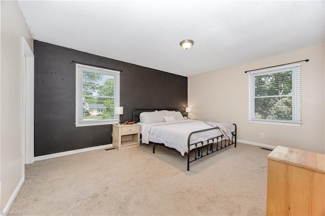 1018 Sequoia Dr, Lewisville, NC 27023 - carpeted bedroom featuring baseboards