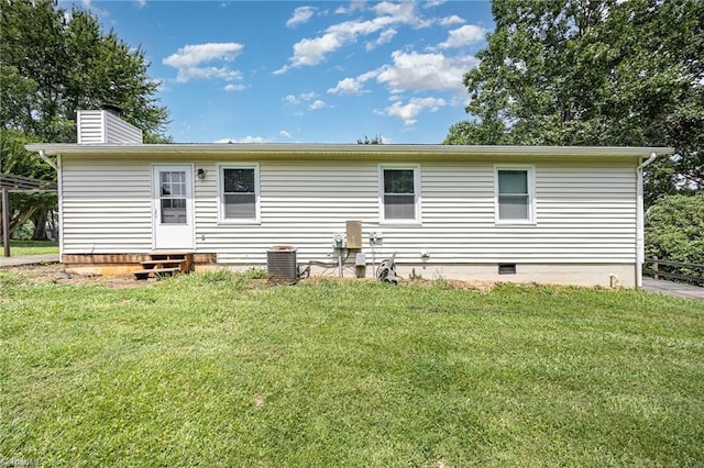 1018 Sequoia Dr, Lewisville, NC 27023 - rear view of property with entry steps, a chimney, and crawl space