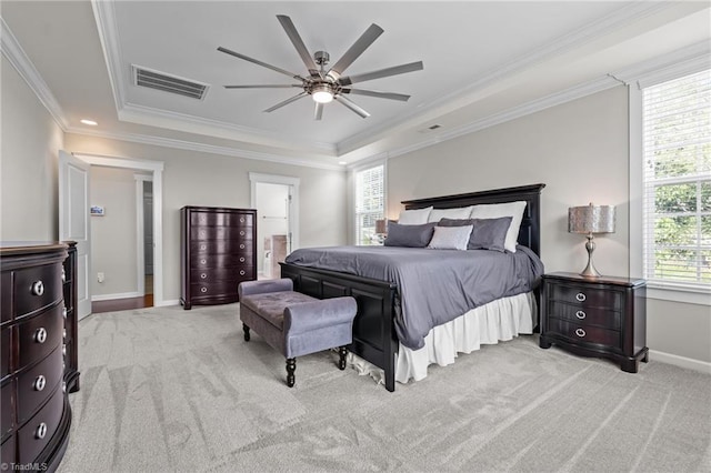 4420 Bonnie Loch Dr, Burlington, NC 27215 - bedroom with a tray ceiling, multiple windows, light carpet, baseboards, and crown molding