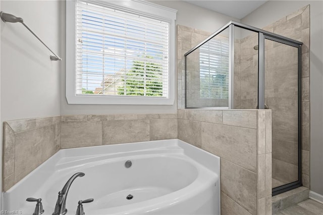 4420 Bonnie Loch Dr, Burlington, NC 27215 - bathroom with a shower stall and a garden tub