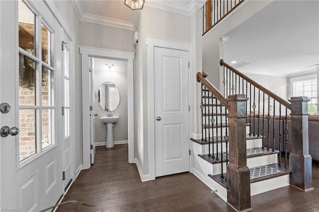 4420 Bonnie Loch Dr, Burlington, NC 27215 - entrance foyer with ornamental molding, dark wood-style flooring, stairs, and baseboards