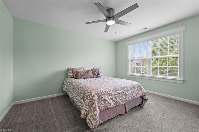 4420 Bonnie Loch Dr, Burlington, NC 27215 - carpeted bedroom with baseboards and ceiling fan