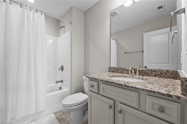 4420 Bonnie Loch Dr, Burlington, NC 27215 - bathroom featuring toilet, shower / tub combo, and vanity