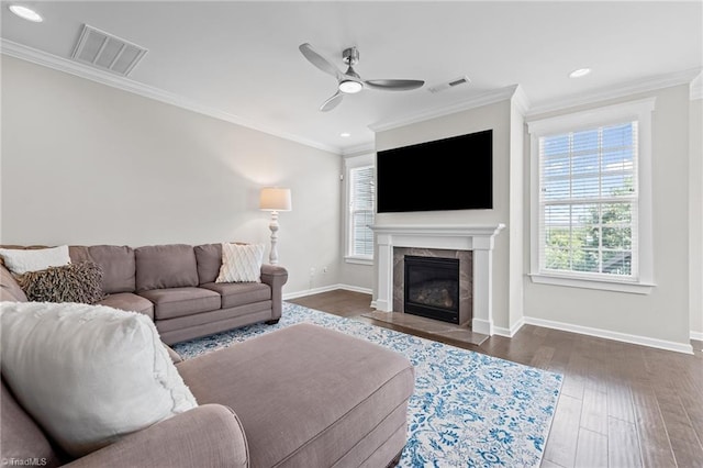 4420 Bonnie Loch Dr, Burlington, NC 27215 - living area featuring ceiling fan, baseboards, ornamental molding, a premium fireplace, and dark wood finished floors