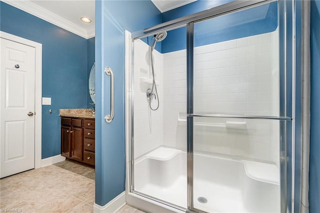 5207 York Place Ct, Walkertown, NC 27051 - bathroom featuring crown molding, a stall shower, vanity, and tile patterned flooring