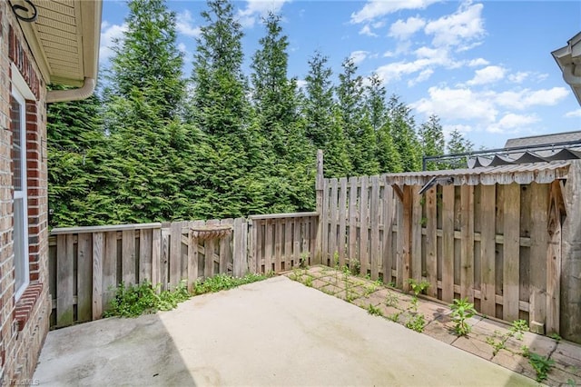5207 York Place Ct, Walkertown, NC 27051 - fenced backyard featuring a patio area