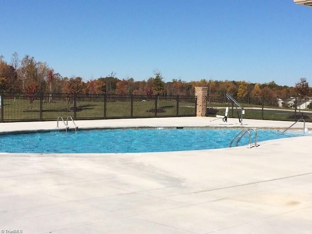 5207 York Place Ct, Walkertown, NC 27051 - community pool with a patio