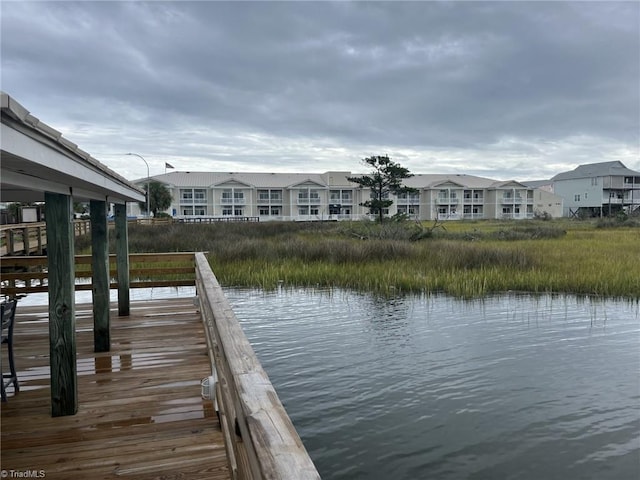 view of dock with a water view