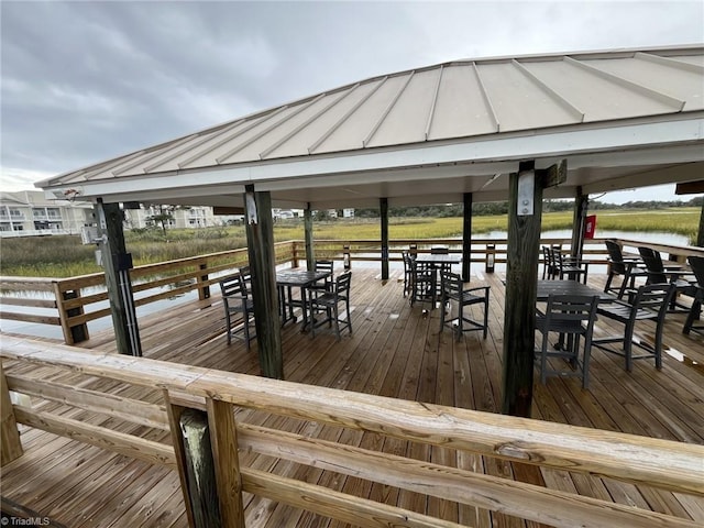 dock area with a gazebo and a water view