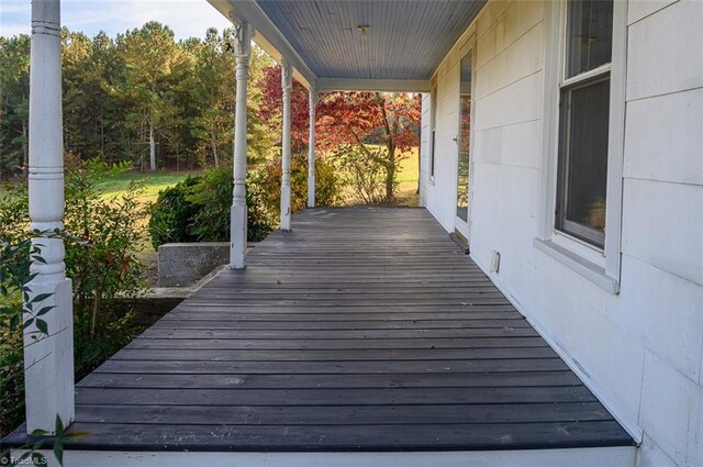 wooden deck featuring covered porch