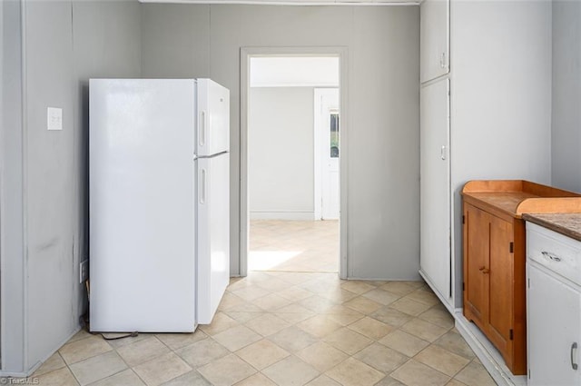 kitchen featuring white fridge