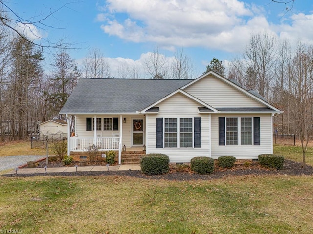 view of front of property with a porch and a front lawn