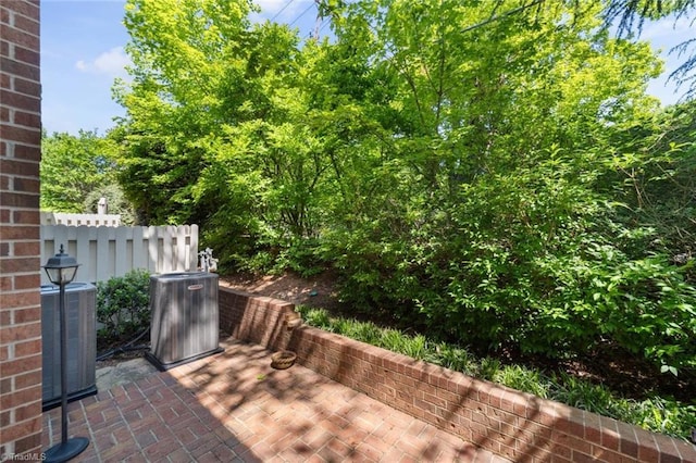 view of patio with central AC unit