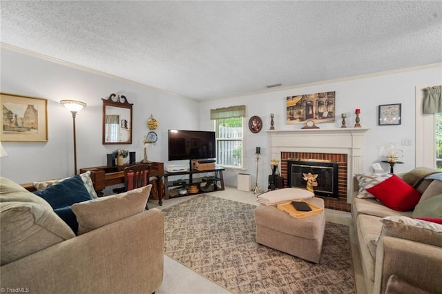 carpeted living area featuring ornamental molding, a textured ceiling, and a fireplace