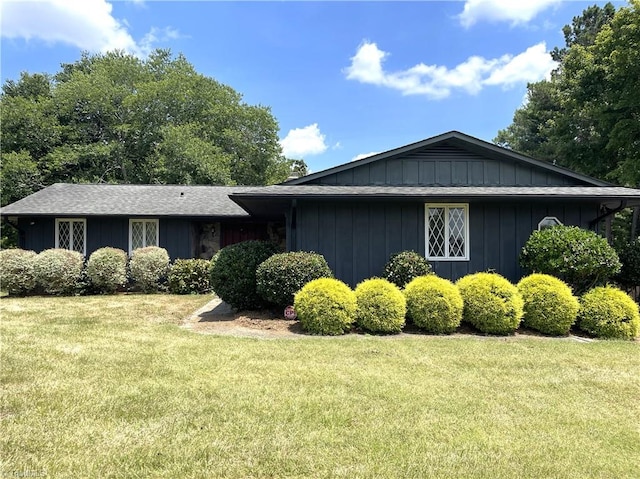 view of property exterior with a yard