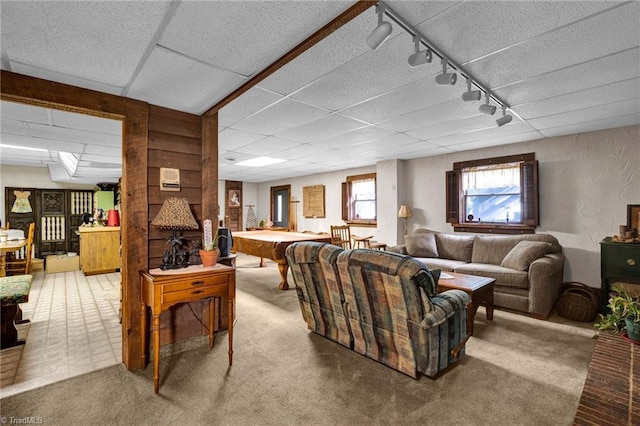 living room featuring pool table, light colored carpet, and rail lighting