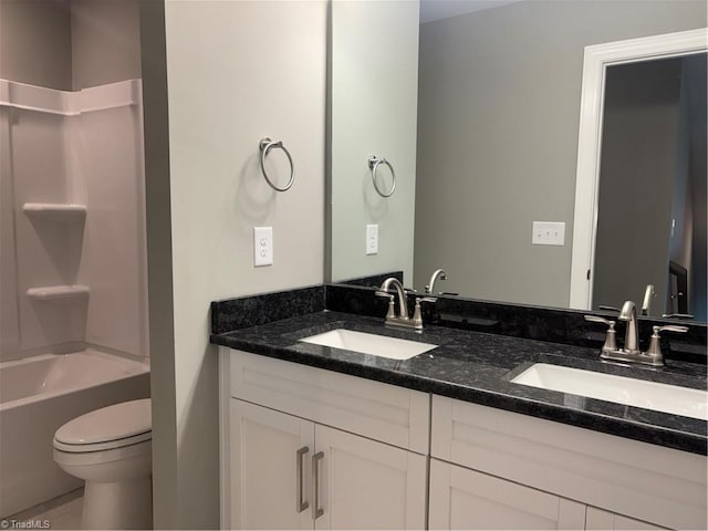 7376 Ridge Rd, Winston-Salem, NC 27107 - bathroom featuring a sink, double vanity, and toilet