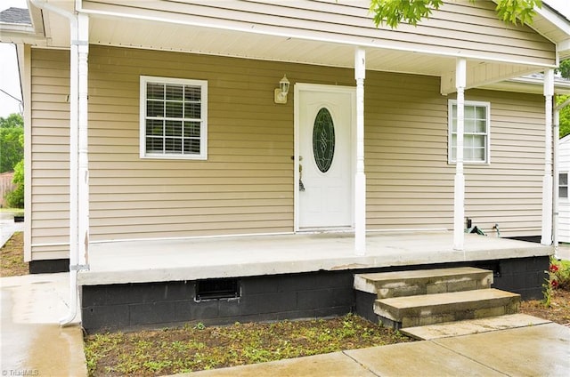 1309 Jackson St, Burlington, NC 27217 - doorway to property featuring a porch and crawl space