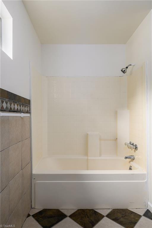 1309 Jackson St, Burlington, NC 27217 - bathroom with tile walls and shower / bath combination