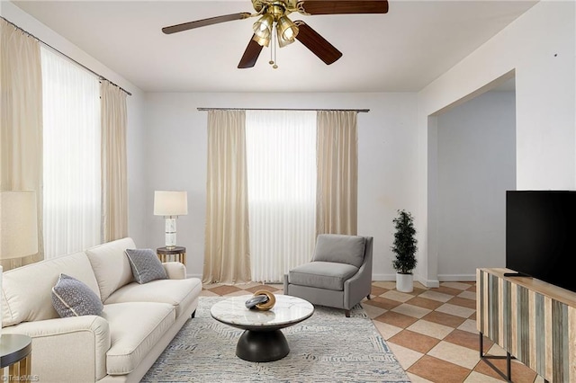 1309 Jackson St, Burlington, NC 27217 - living area featuring ceiling fan and baseboards