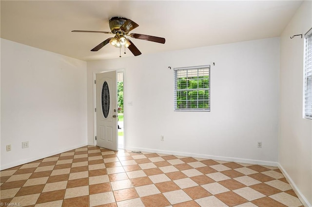 1309 Jackson St, Burlington, NC 27217 - spare room with ceiling fan and baseboards