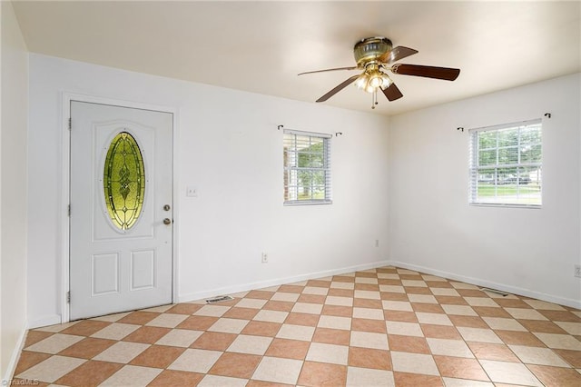 1309 Jackson St, Burlington, NC 27217 - entrance foyer with plenty of natural light, a ceiling fan, and baseboards