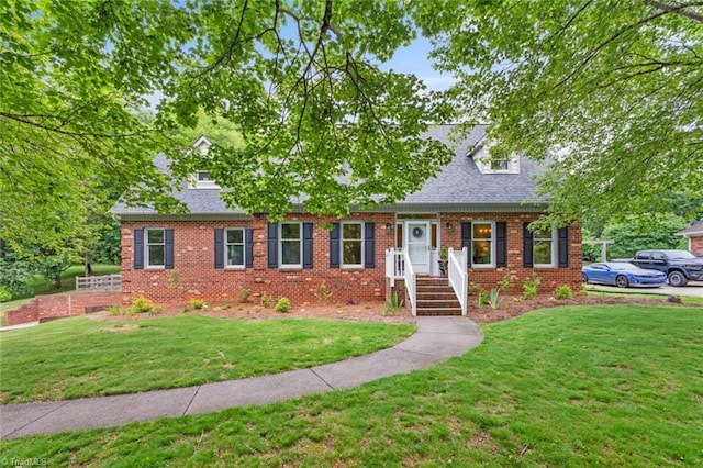 641 Doe Run Dr, Kernersville, NC 27284 - cape cod house with a front yard, brick siding, and roof with shingles