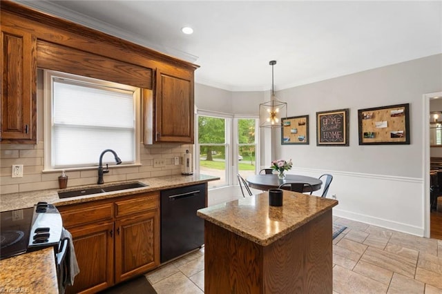 641 Doe Run Dr, Kernersville, NC 27284 - kitchen with dishwasher, a sink, a kitchen island, decorative backsplash, and light stone counters
