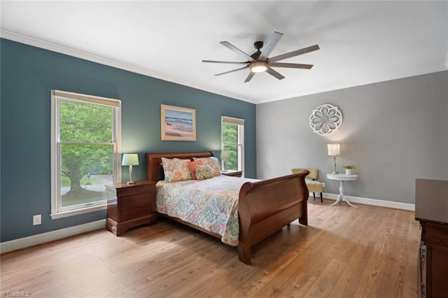 641 Doe Run Dr, Kernersville, NC 27284 - bedroom with crown molding, wood finished floors, baseboards, and ceiling fan