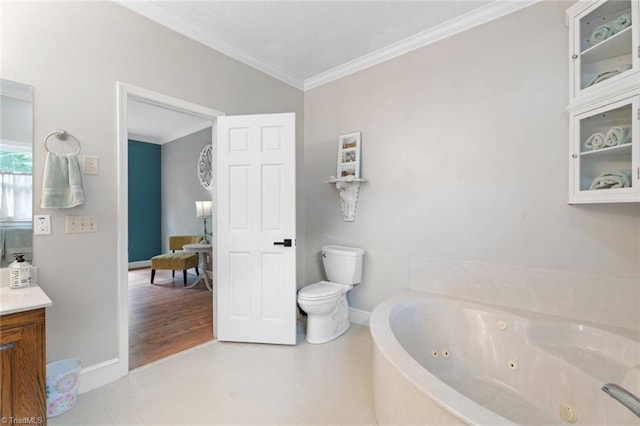 641 Doe Run Dr, Kernersville, NC 27284 - bathroom with toilet, crown molding, vanity, a tub with jets, and baseboards