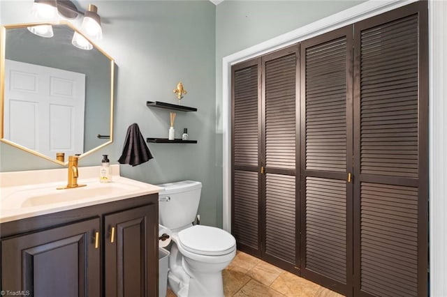 641 Doe Run Dr, Kernersville, NC 27284 - bathroom with toilet, vanity, and a closet